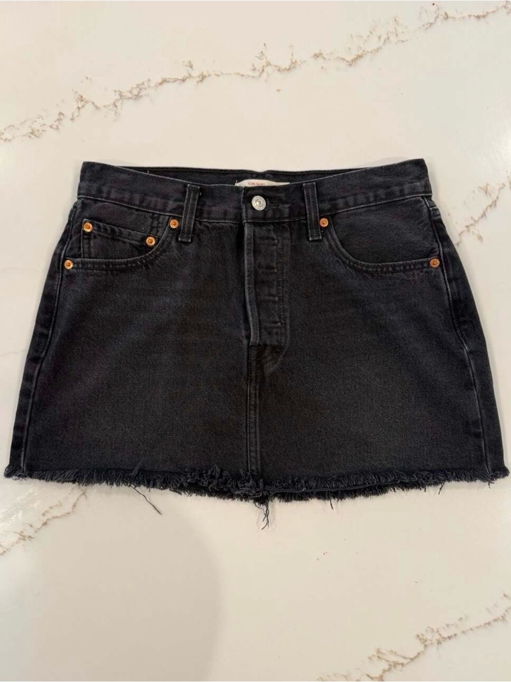 Levi’s Black Denim Mini Skirt with Raw Hem